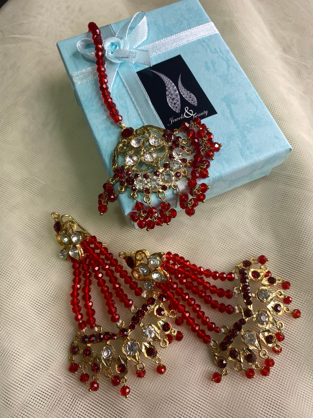 Red Crystal Indian Jewelry: Gold Plated Jhummar Earrings & Tikka Set