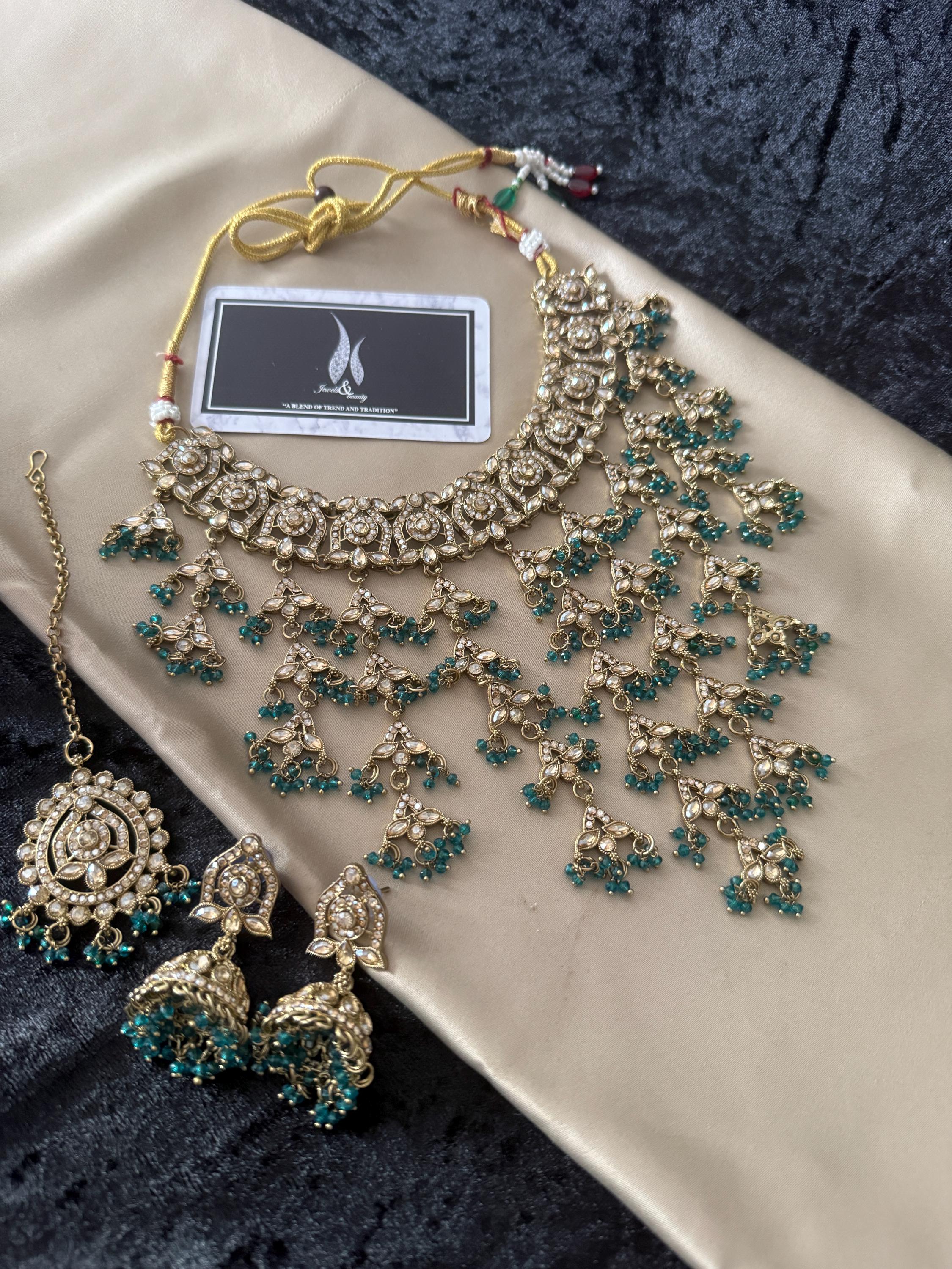 Polki choker jhumki and tikka set antique polish Green jewellery set , Indian jewelry Pakistani jewellery  Jhumki Earrings,